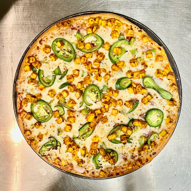 Savor Our Paneer Pizza
